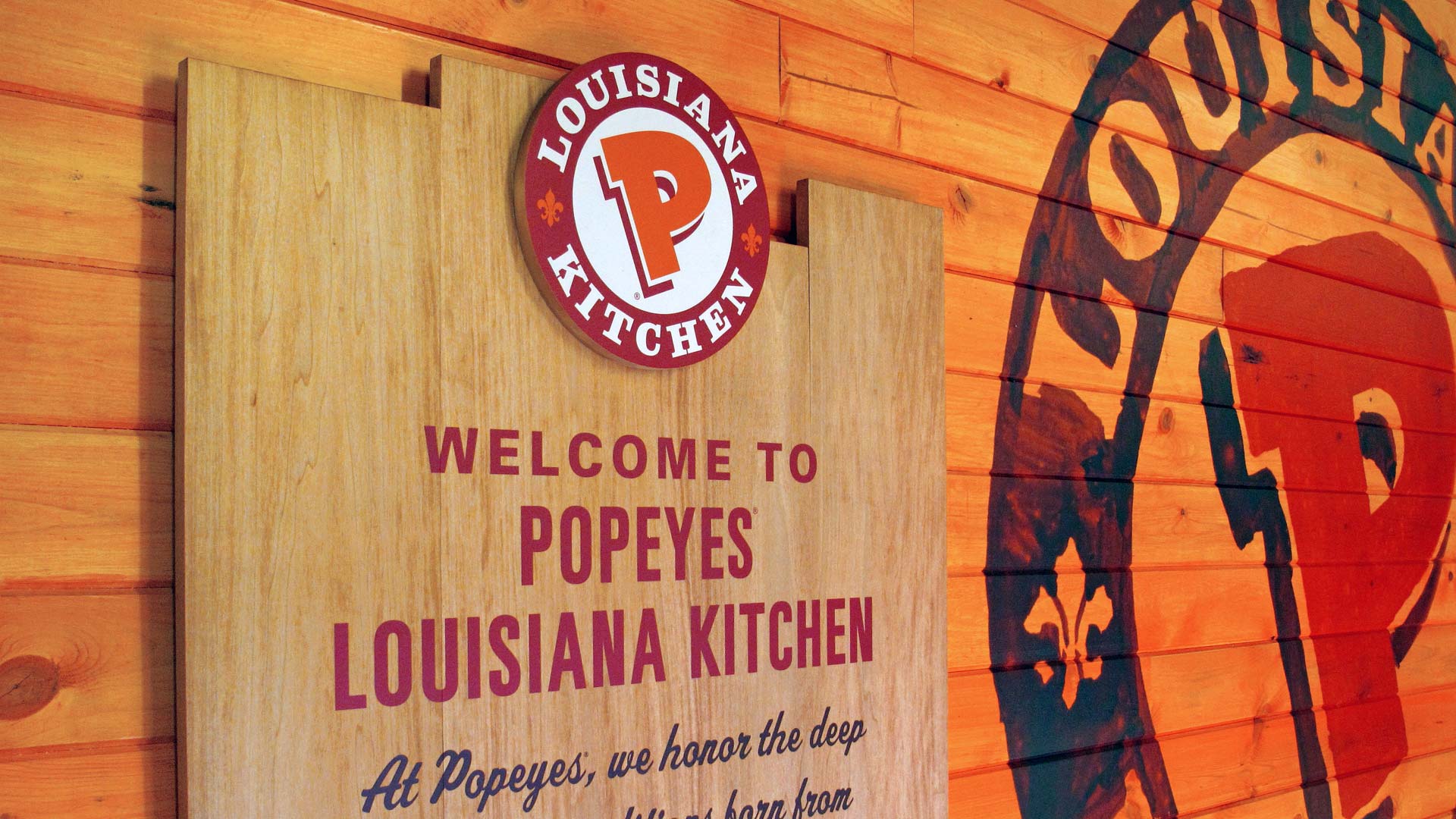 QSR retail environment graphics and signage - Popeyes